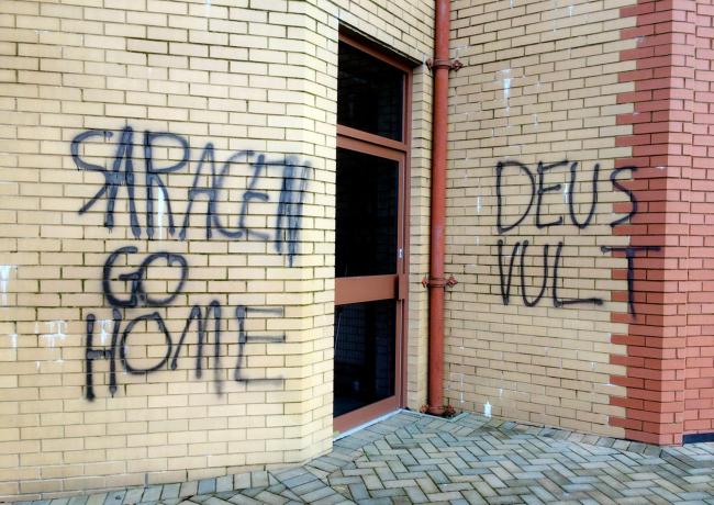 Undated handout photo issued by the Islamic Education Trust of graffiti at the Islamic Education Trust mosque in Cumbernauld, North Lanarkshire. PRESS ASSOCIATION Photo. Issue date: Saturday December 17, 2016. See PA story SCOTLAND Mosque. Photo credit sh